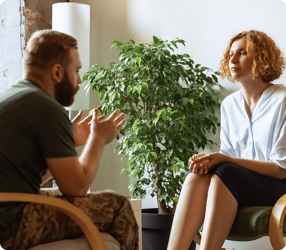 Therapist and patient in counseling session.